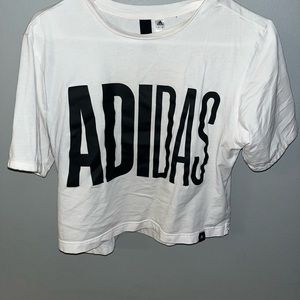 White Adidas T-shirt.
